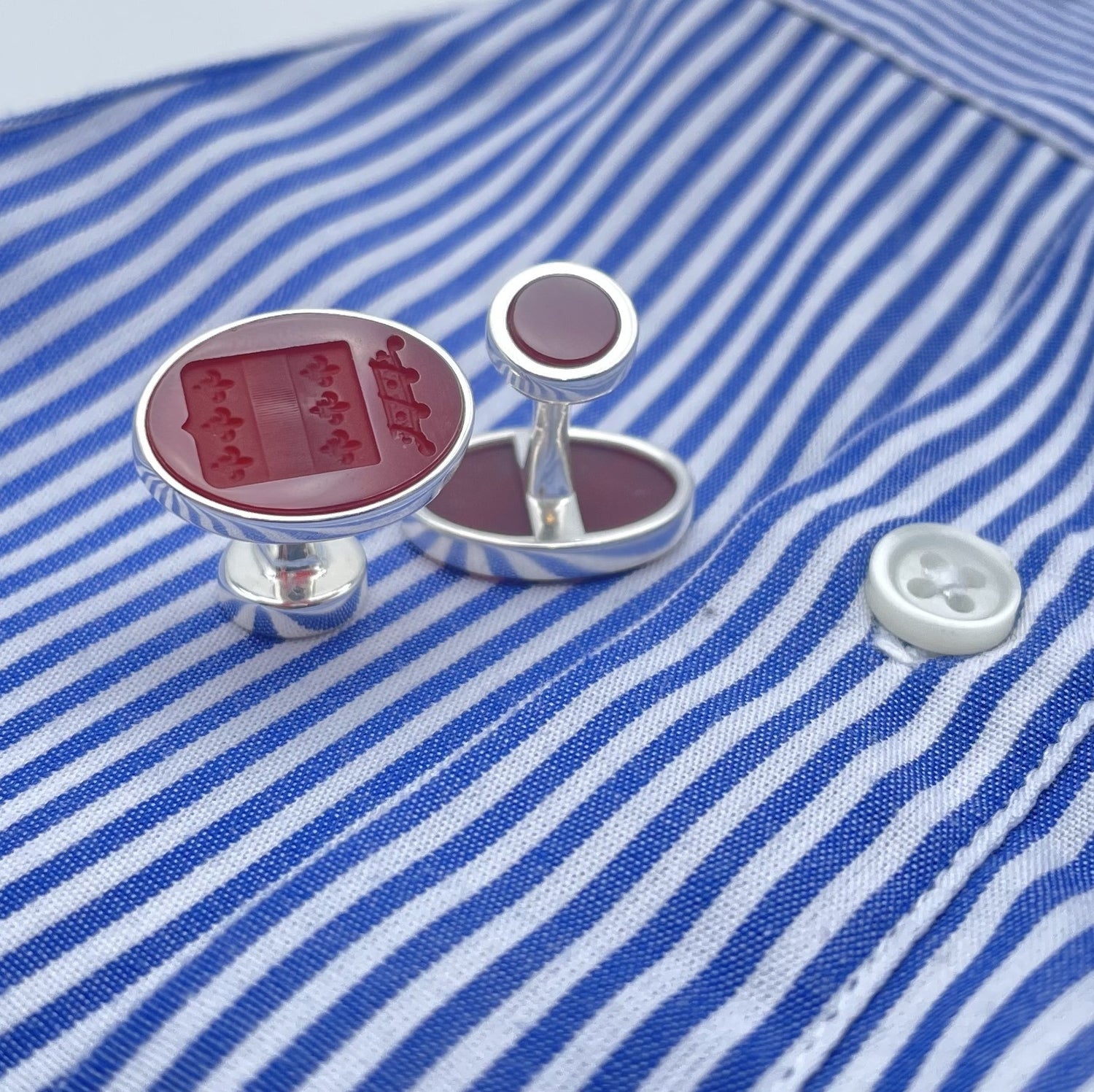 Cufflinks with heraldic symbol engraved on red carnelian